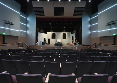 Theater Auditorium seating dark purple installed by BROC