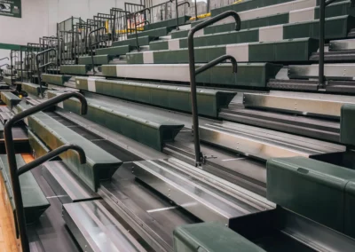 Green telescoping bleachers provided and installed by BROC