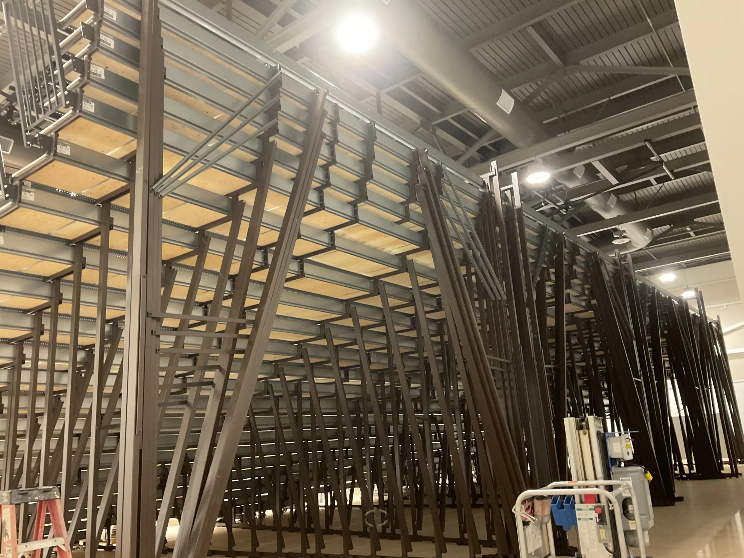 Telescoping bleacher bracing structure