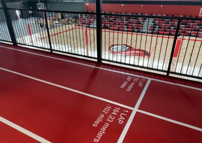 Gymnasium track floor with graphics