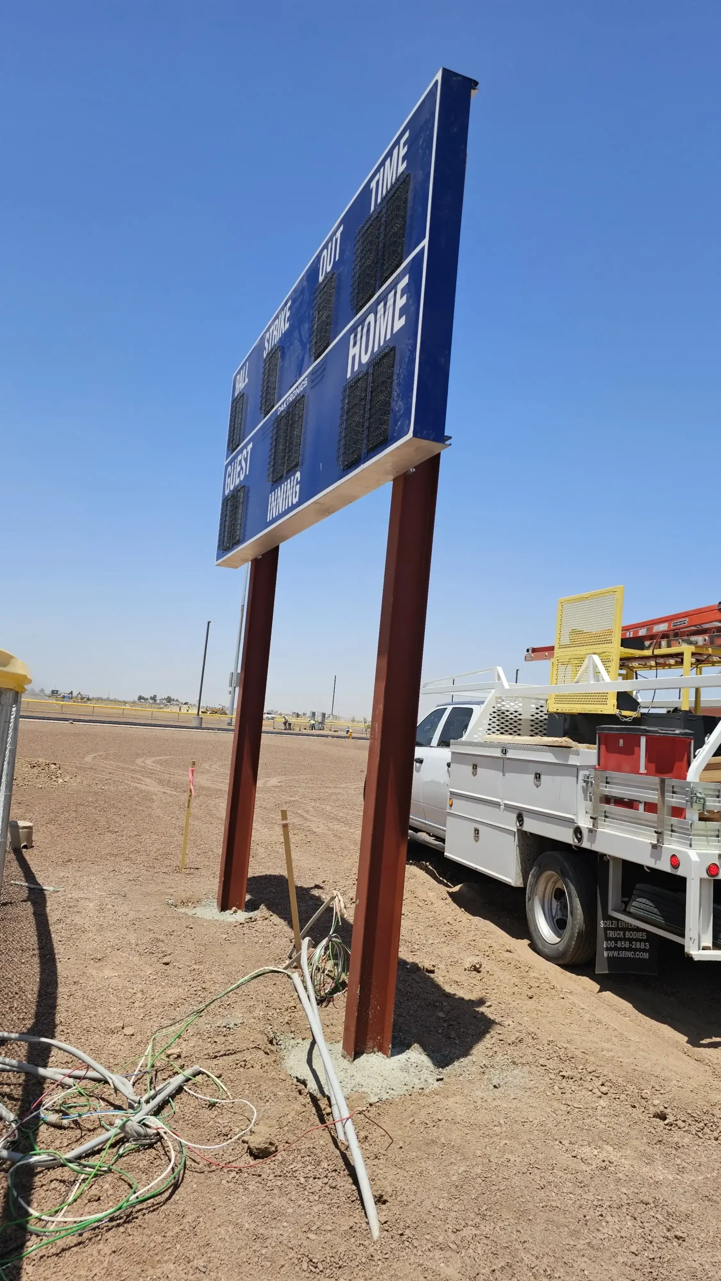 Baseball scoreboard being installed by BROC at High School